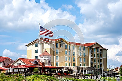 Three quarter horizontal view of the The Waterâ€™s Edge Lighthouse Restaurant, a 19th- Editorial Stock Photo